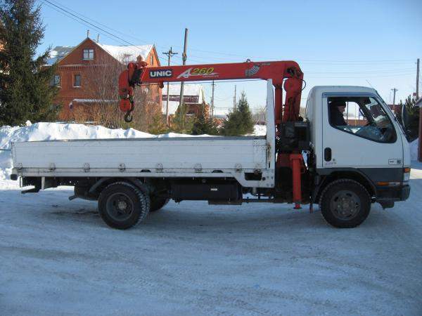 Доставка строительных материалов манипулятором