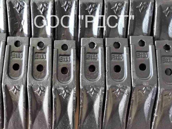 E11.1 Зуб на миниэкскаватор 7000986, 2209089