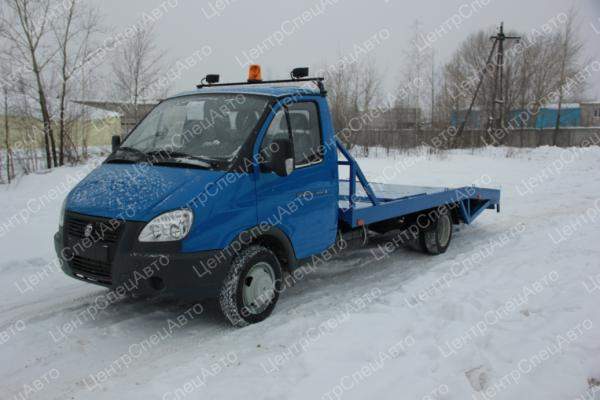ГАЗ 3302 Эвакуатор ломаная платформа со стацион. лебедкой1