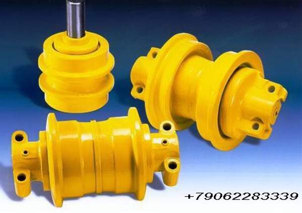 Опорные и поддерживающие катки экскаваторов и бульдозеров