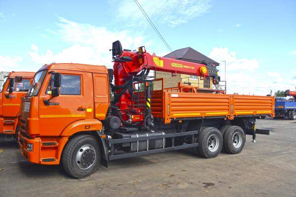 PALFINGER INMAN IT 150 с металлической платформой на шасси КАМАЗ-65115-3094-50