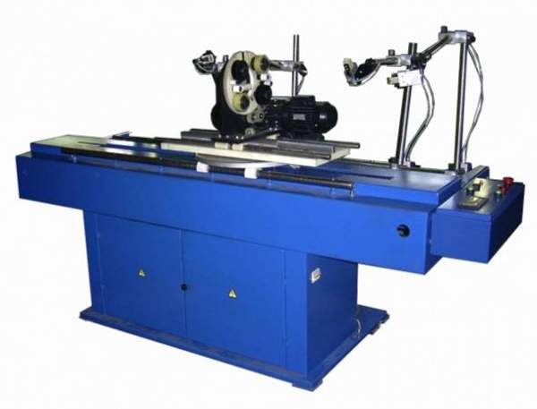 Станок для наложения корпусной изоляции на статорные катушки кэм