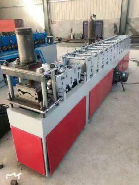 Станок для производства подъёмно-складчаты ворота в Китае