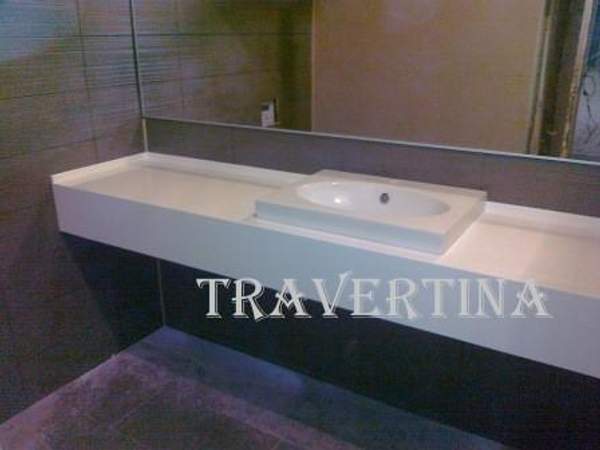 Столешницы для ресепшн и барных стоек из искусственного камня.