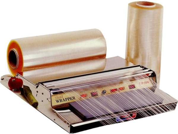 Упаковщик в стрейч-пленку на лотке - горячий стол