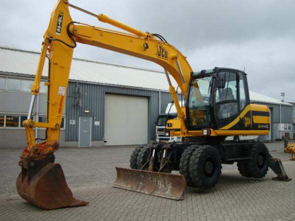 Услуги, аренда, заказ колесного экскаватора.