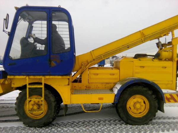 Купить полностью исправный снегопогрузчик лаповый СнП-17, 2012 год выпуска, наработка 834 моточаса. — фото 1