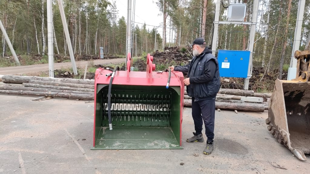 Просеивающий ковш