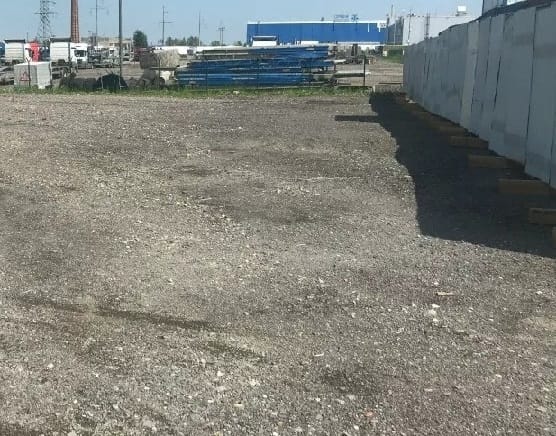 Открытая огороженная площадка под складирование 730 кв.м.