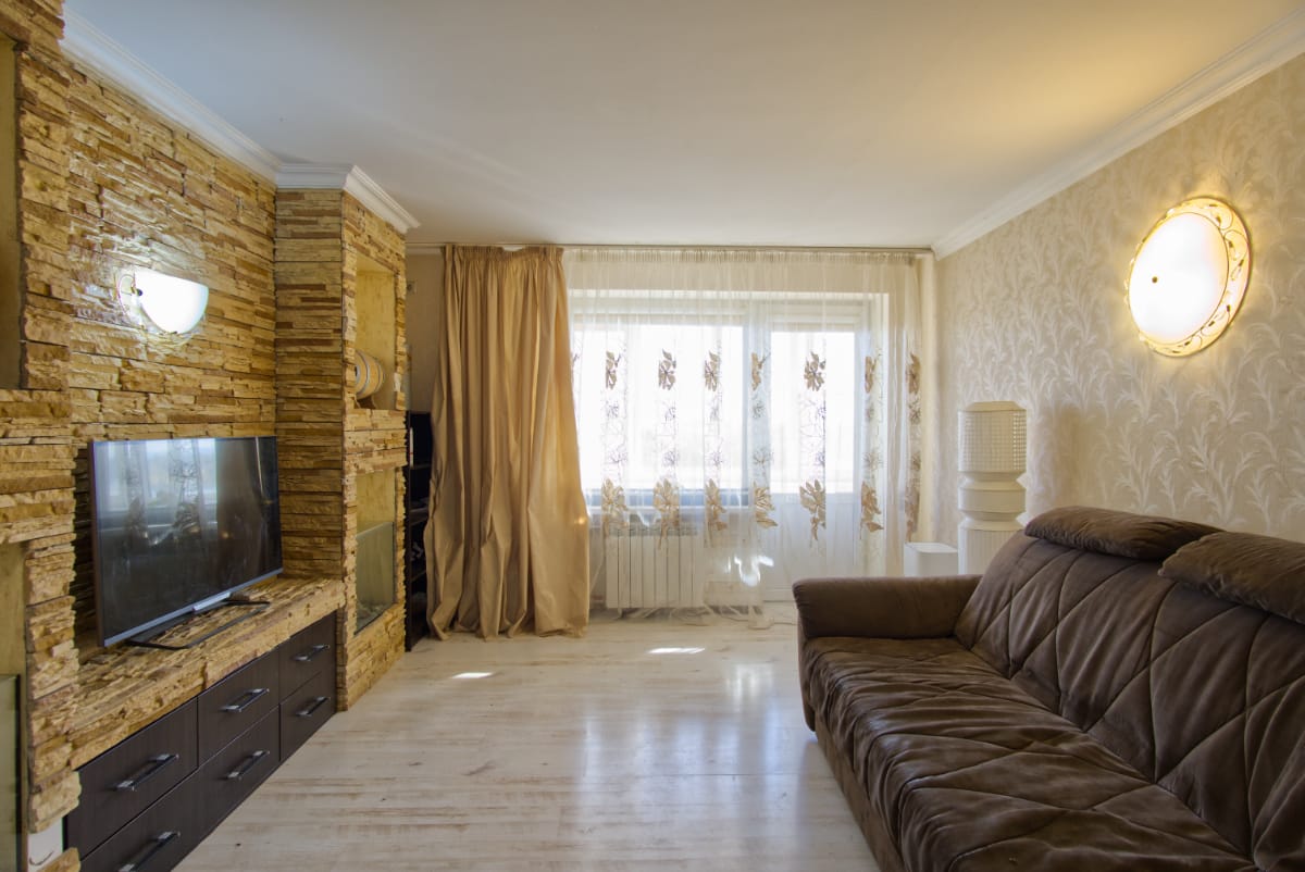 Квартира с видом на горы и озеро в кирпичном доме