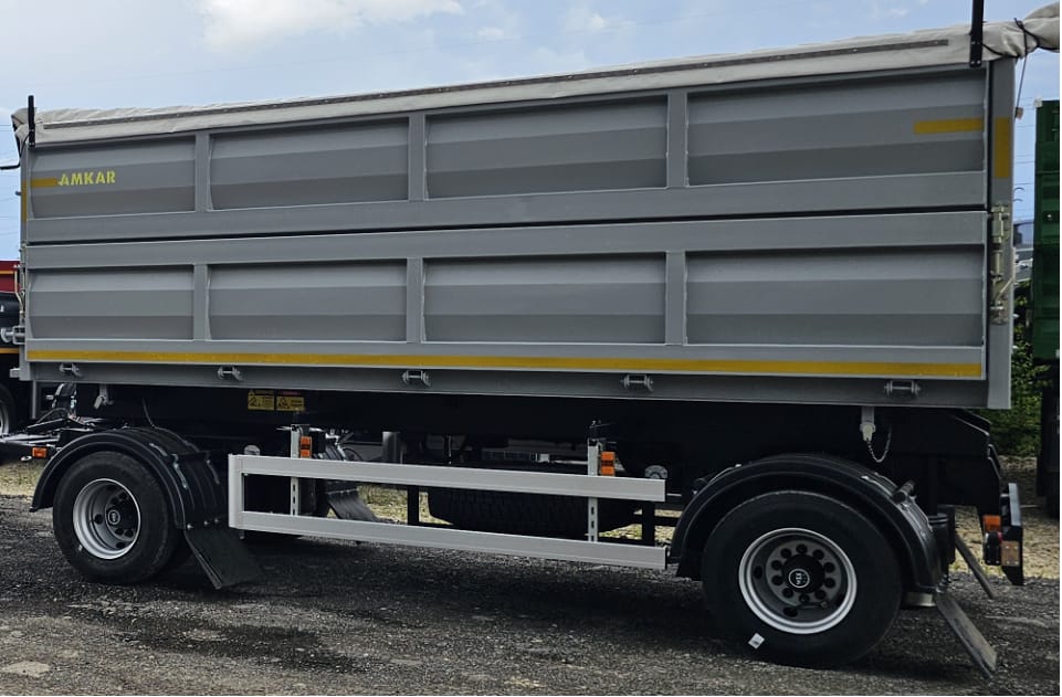 Новый двухосный (двускатная резина) самосвальный прицеп объемом 17 м.куб. до 13.2 тонн по цене завода!