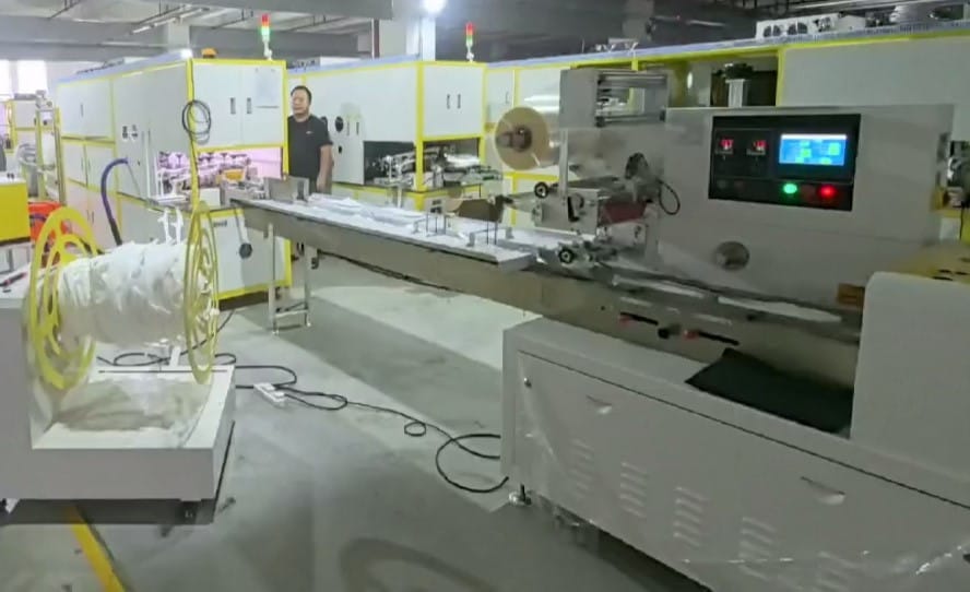 Автоматическая линия для пошива тапочек